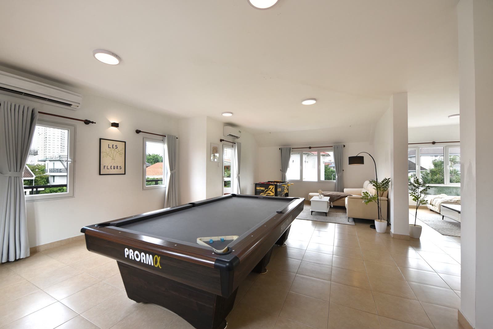 Pool table seen from the other side of the games room