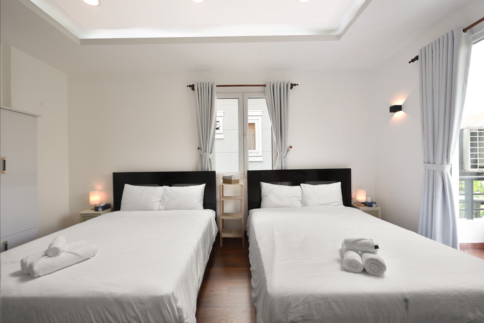 Bedroom with two queen beds seen from the door